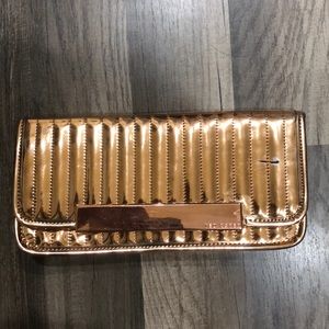 Ted Baker rose gold clutch